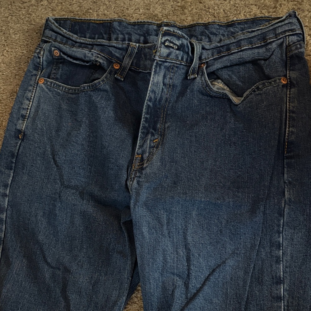 Levi's Men's Mid to Dark Blue Relaxed Fit Jeans